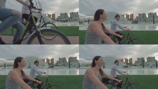一对夫妇在自行车道上一起骑自行车高清在线视频素材下载