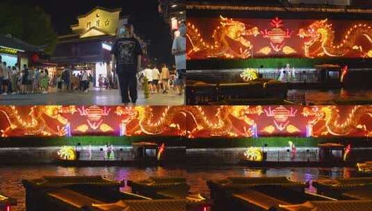 水上舞台表演灯光璀璨的舞龙秀高清在线视频素材下载
