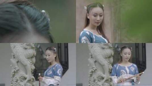 慢镜头古装美女中国风盘龙石柱拿笛子美高清在线视频素材下载