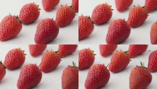 升格拍摄落到桌上反弹酸甜可口新鲜草莓高清在线视频素材下载