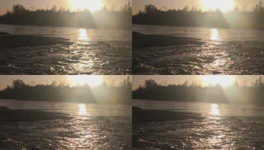 夕阳下的江河涌动高清在线视频素材下载