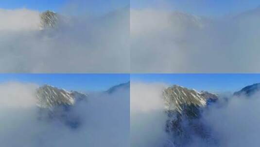 航拍冬天云雾中雪山四川巴郎山高清在线视频素材下载