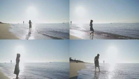 阳光下美女跑向海边玩耍踢海水欢快女孩少女高清在线视频素材下载