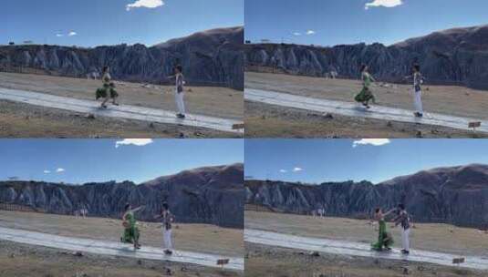 枯黄草原高原石林情侣拍婚纱写真奔跑拥抱高清在线视频素材下载