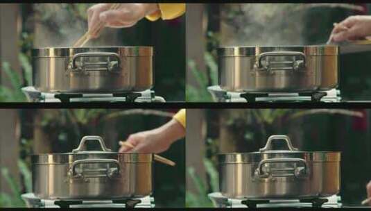 4K厨师在烹饪盖上锅盖高清在线视频素材下载