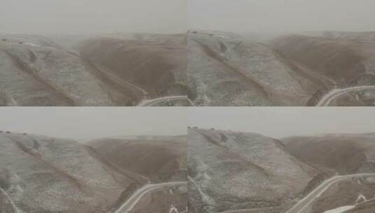 航拍冬日飞雪下的夏河县国道高清在线视频素材下载
