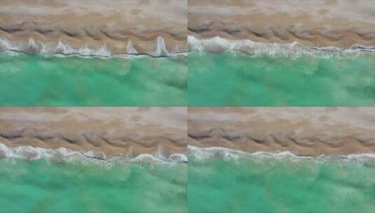 航拍清澈的海和海浪高清在线视频素材下载