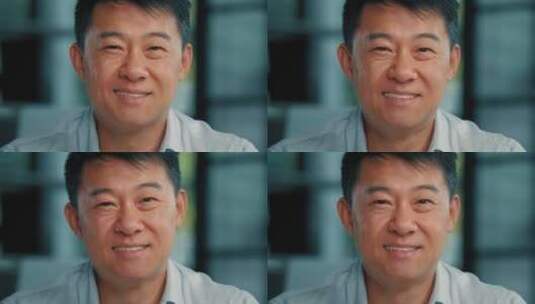 亚裔中年男士的面部微笑高清在线视频素材下载