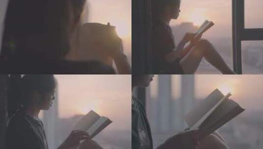 女孩在夕阳下的落地窗边看书翻书4k视频高清在线视频素材下载