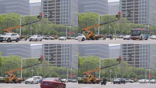 维修安装交通红绿灯的工人高清在线视频素材下载