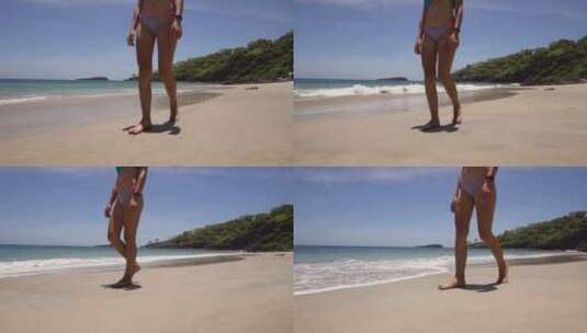 女孩走在海滩上高清在线视频素材下载
