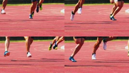 在跑道上比赛跑步的运动员腿部特写！高清在线视频素材下载