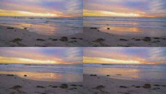 日落时分海浪拍打在沙滩上高清在线视频素材下载