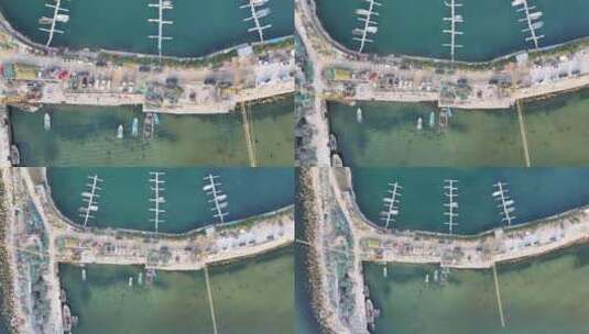 航拍威海高新区金海滩海边快艇码头塔吊高清在线视频素材下载