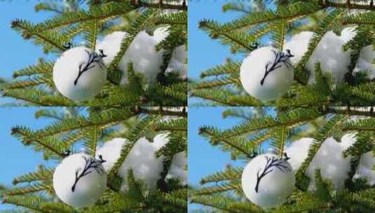圣诞树上的积雪和装饰彩球高清在线视频素材下载
