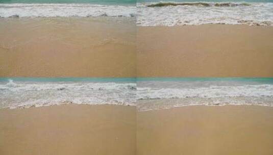 海南三亚海边海浪拍打沙滩沙子高清在线视频素材下载