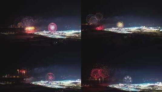 4K哈尔滨冰雪大世界摩天轮夜景烟花航拍高清在线视频素材下载