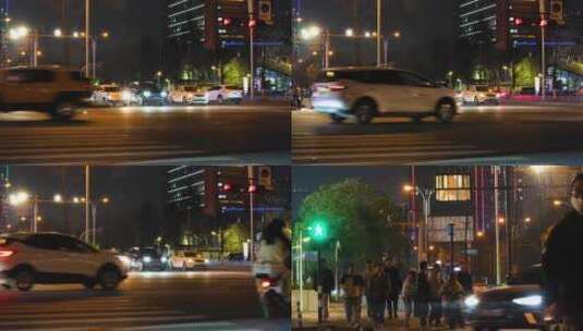 夜晚城市行人过马路汽车车辆车流人流夜景高清在线视频素材下载