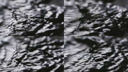 黑色背景下的水流水波纹波浪浪花高清在线视频素材下载