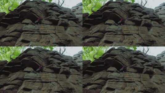 爬岩石的女人高清在线视频素材下载