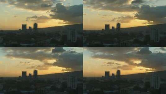 城市里多云的夕阳高清在线视频素材下载