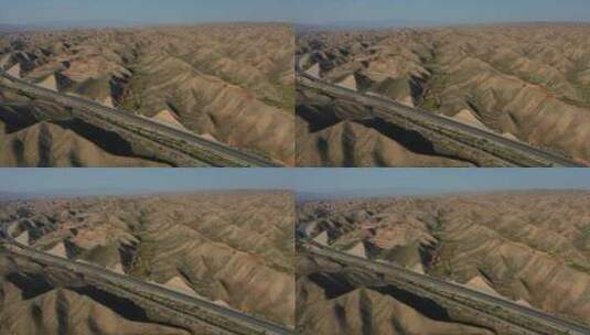 公路穿过甘肃兰州黄土高原土丘地貌高清在线视频素材下载