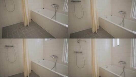 在空浴室内倾斜拍摄揭示浴缸高清在线视频素材下载