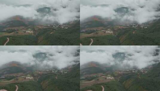 旅游风光宣传东川红土地透过云雾森林田野高清在线视频素材下载