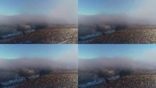 航拍大兴安岭冬季山林雾凇云雾高清在线视频素材下载