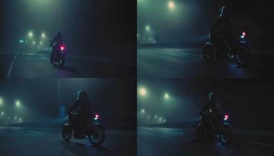 夜间道路上行驶的摩托车高清在线视频素材下载
