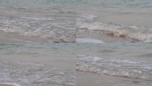 浪花特写海浪海水冲击沙滩浪花泡沫高清在线视频素材下载