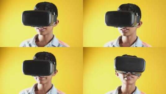 男孩戴着虚拟现实耳机VR盒高清在线视频素材下载