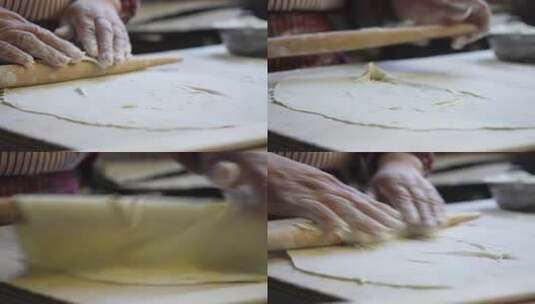 使用擀面杖制作面饼高清在线视频素材下载