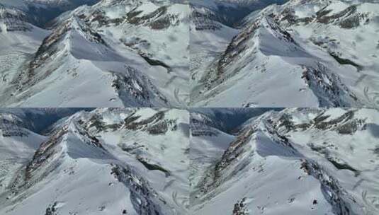 航拍攀登四川岷山山脉主峰雪宝顶的攀登者高清在线视频素材下载