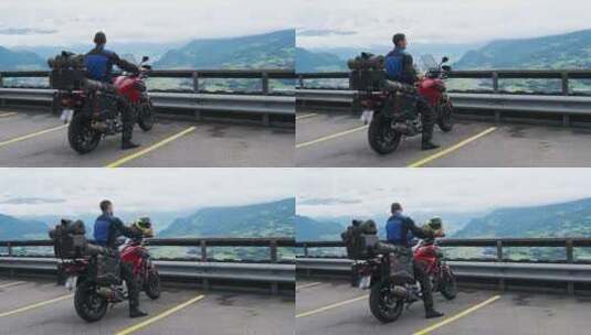 摩托车手在看山景高清在线视频素材下载