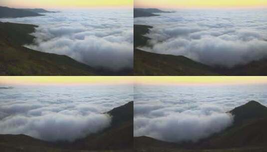 日出前的黄昏山顶上的云彩景观高清在线视频素材下载