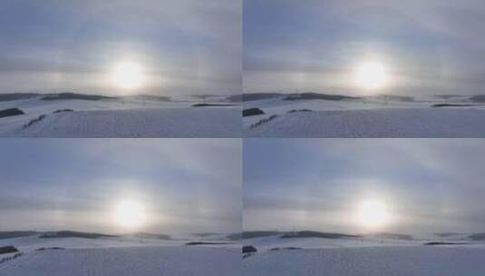 航拍东北雪域雪原日晕高清在线视频素材下载