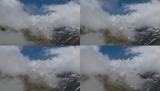 白雪皑皑和烟雾弥漫的山脉高清在线视频素材下载