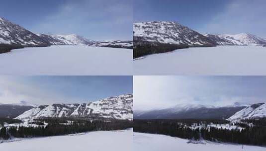 航拍新疆冬季喀纳斯神仙湾晨雾雪山森林雪景高清在线视频素材下载