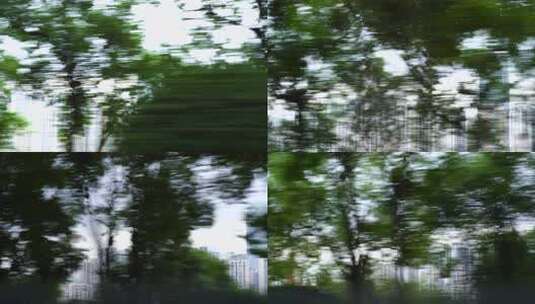 车窗外城市建筑风光车侧窗树林快速模糊树影高清在线视频素材下载