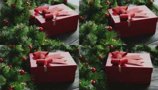 圣诞树旁边放着的红色礼物盒高清在线视频素材下载