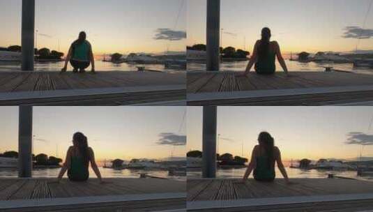 女人在海边看夕阳高清在线视频素材下载