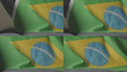 巴西国旗挂在家里沙发上的特写高清在线视频素材下载