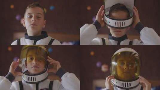 穿着宇航服的小男孩戴上头盔高清在线视频素材下载