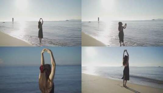 美女在海边跳舞海滩沙滩上玩耍海水海浪大海高清在线视频素材下载