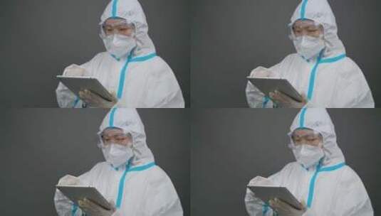 亚洲中国人女士穿医用防护服工作实验做核酸高清在线视频素材下载
