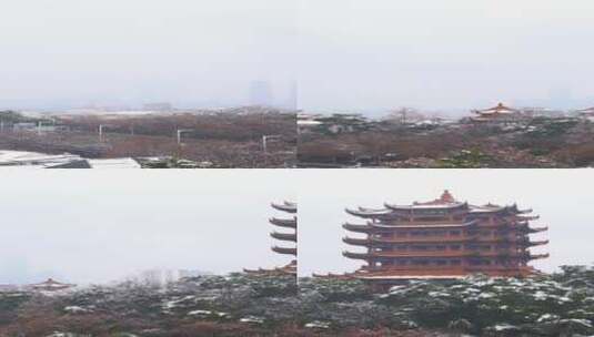 冬天白雪中的武汉城市地标武昌蛇山黄鹤楼高清在线视频素材下载