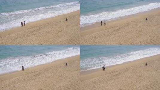 深圳大梅沙海滩情侣游客一人静坐沙滩上高清在线视频素材下载
