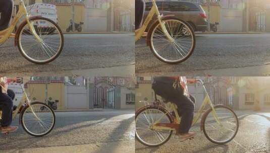 阳光下自行车行驶车轮旋转高清在线视频素材下载