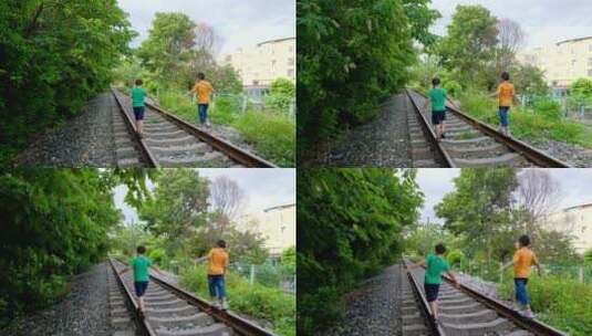 两个小孩走在铁路上高清在线视频素材下载